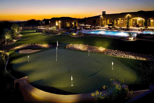 Southwest Greens of Austin artificial golf green with sand trap at luxury home